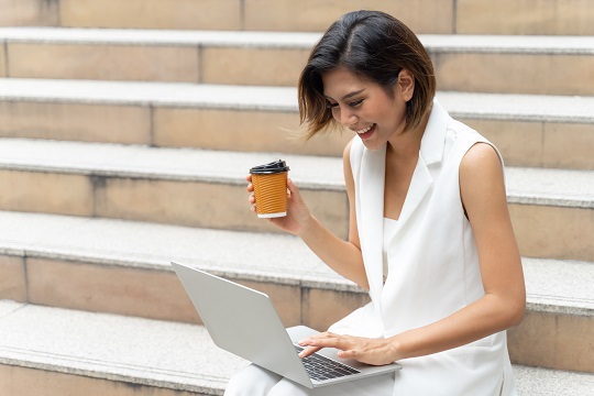 beautiful-cute-girl-smiling-business-woman-clothes-using-laptop-computer-urban-city-3